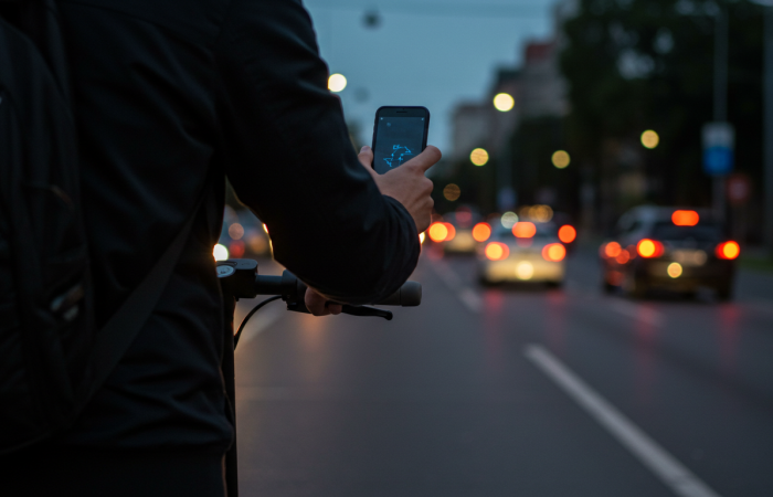 Can You Use A Mobile Phone When Riding An electric Scooter? Safety Rules Explained