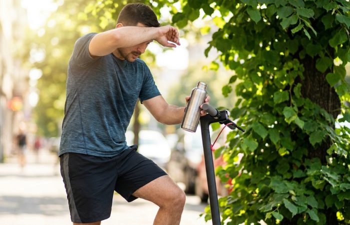 How Can You Stay Cool and Safe Riding an Electric Scooter in Summer?